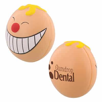 Foam smiling funny face stress ball with a printed logo.