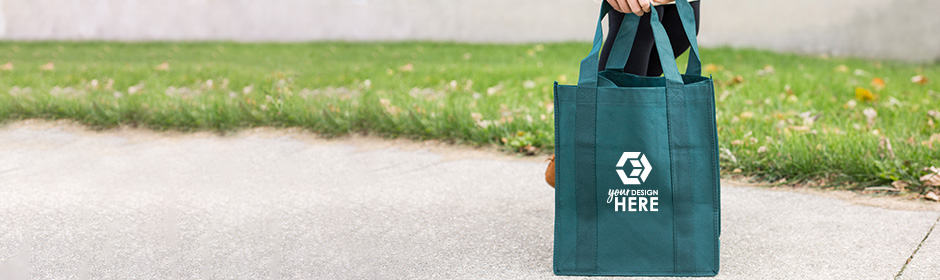 Green non-woven tote bag with white imprint