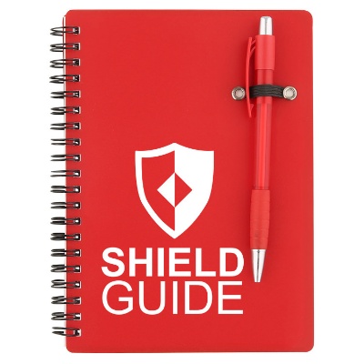 Translucent red branded notebook with matching pen.