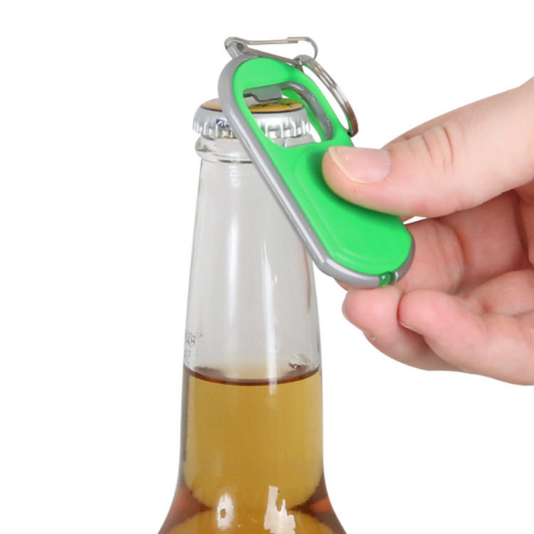 Plastic keychain light with metal bottle opener.