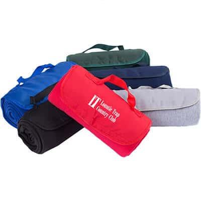 Customizable red sweatshirt blanket that can fold within itself with attached handle.