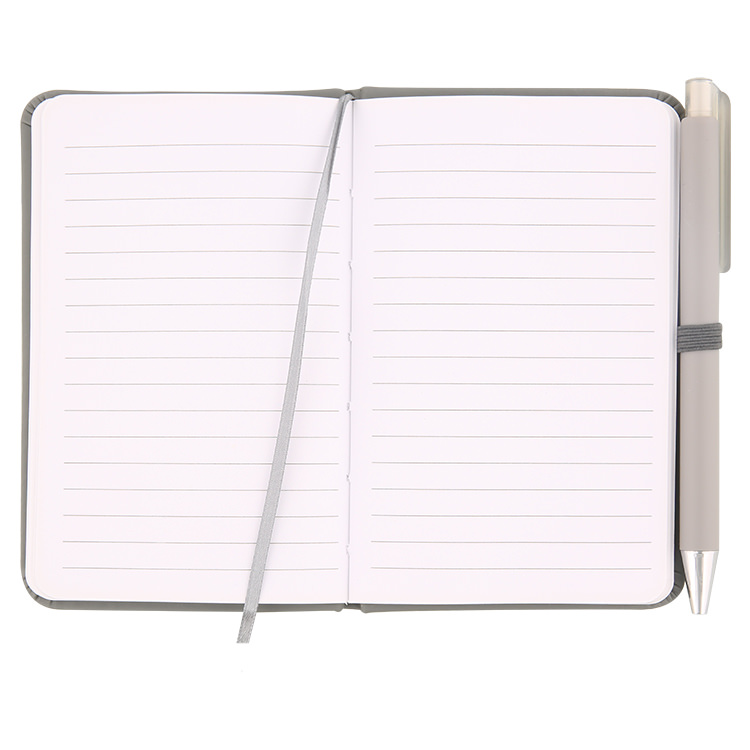 Mini leatherette notebook with pen.
