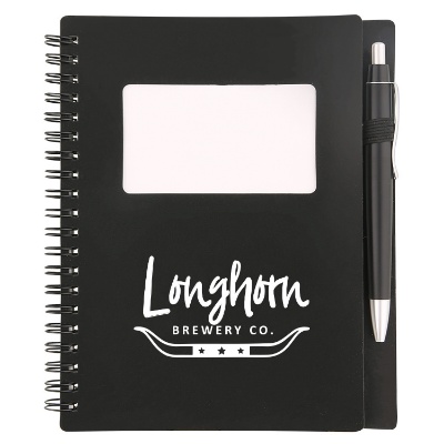 Customized black notebook with photo window and pen.