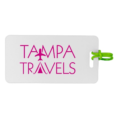 Customized white luggage tag with green strap.