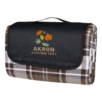Embroidered cream plaid water-resistant polyester blanket with a handle and velcro closure.
