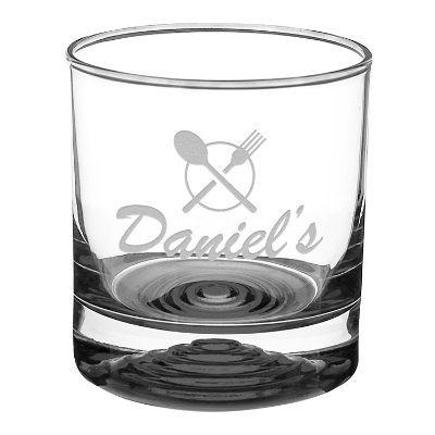 Black whiskey glass with engraved logo.