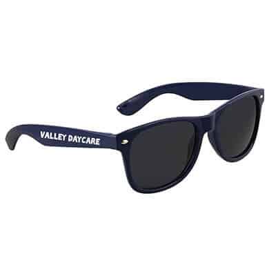Polycarbonate navy blue sunglasses with printed logo.