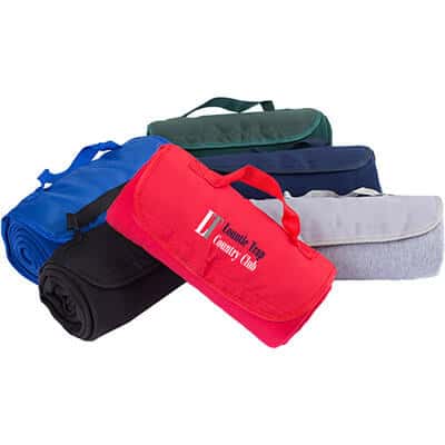 Red sweatshirt blanket that can fold within itself with attached handle with full color logo.