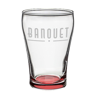 Red beer glass with engraved logo.