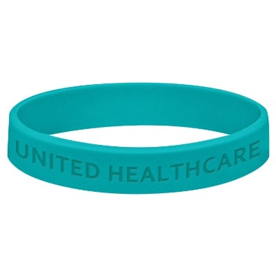 Teal engraved silicone bracelet with a custom logo.