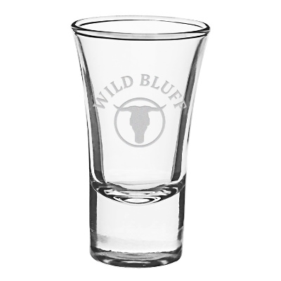Clear shot glass with engraved logo.