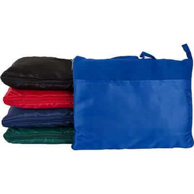 Blank royal blue fleece blanket that can fold into a zipper closure with a handle.