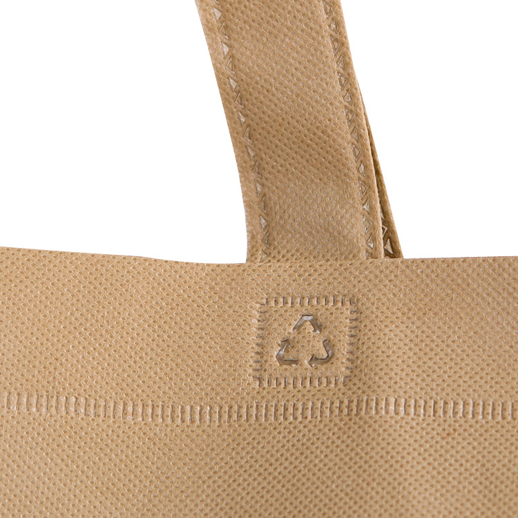 Polypropylene tote bag with matching bottom insert.