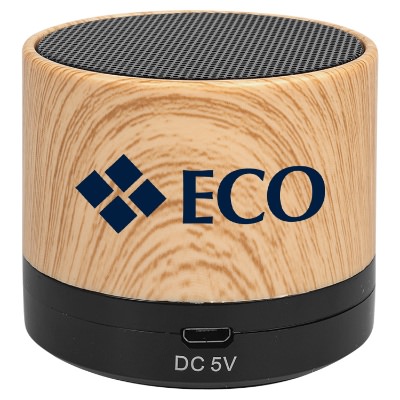 Wood plastic speaker with a personalized logo.