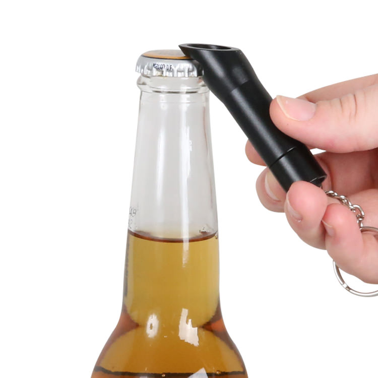Aluminum flashlight keychain bottle opener.