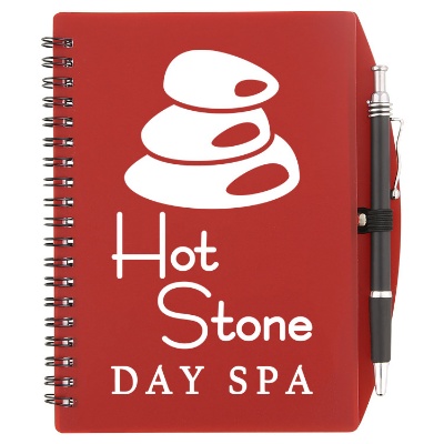 Translucent Red spiral notebook with pen and logo.