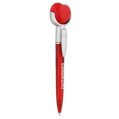 Foam and plastic heart stress reliever pen top.