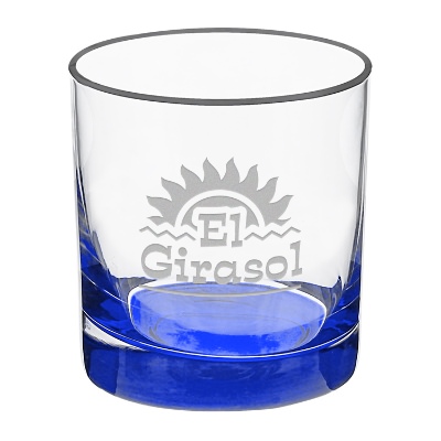 Blue whiskey glass with engraved logo.