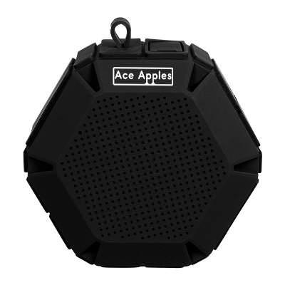 Black plastic wireless speaker with a custom imprint.