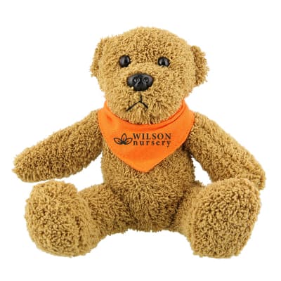 Plush and cotton bear with orange bandana with branded imprint.