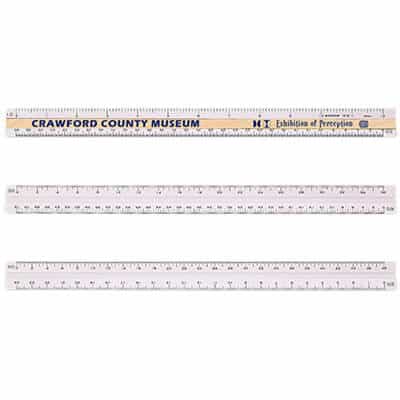 White triangular 12 inch engineering ruler with imprint.