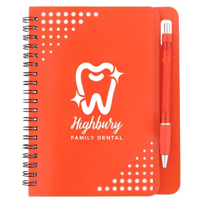 Customized red notebook with pen.