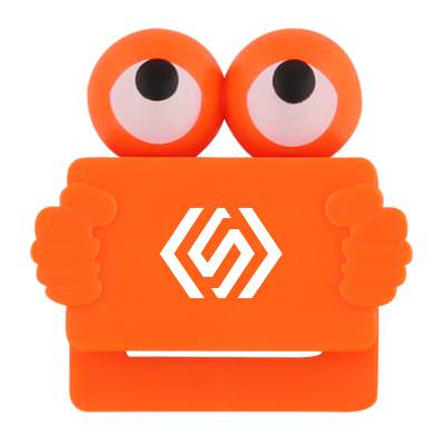 Plastic orange cam-covering creature with printed logo.