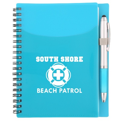 Teal notebook with matching pen and custom logo.