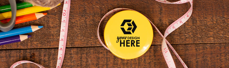 Yellow branded tape measure with black imprint