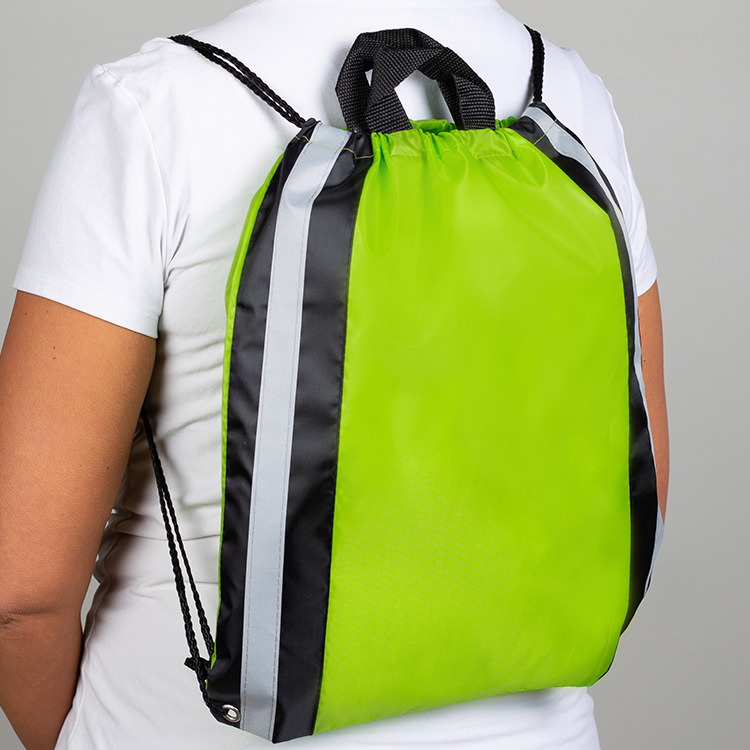 Polyester drawstring with reflective straps, top handle, and reinforced corners.