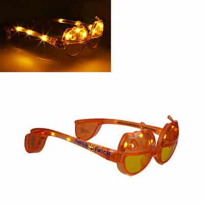 Plastic orange LED pumpkin shaped sunglasses with branded logo.