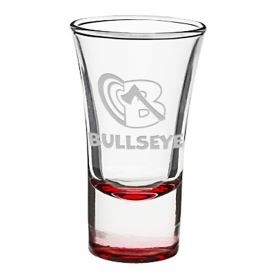 Red shot glass with engraved logo.
