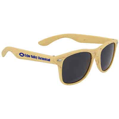 Polycarbonate woodtone beige maui sunglasses with branded logo.