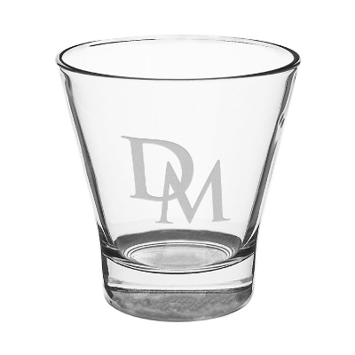 Clear martini glass with engraved logo.
