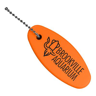 Poly vinyl chloride oval floater keychain with custom imprint. 