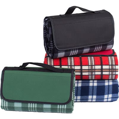 Customized green plaid fleece blanket with attached handle.