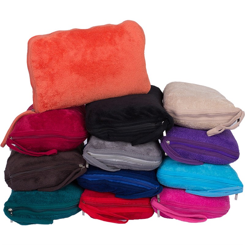 Blank blanket in a zip-up pillow travel bag.