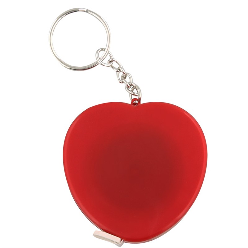Metal, plastic and vinyl heart tape measure keychain.