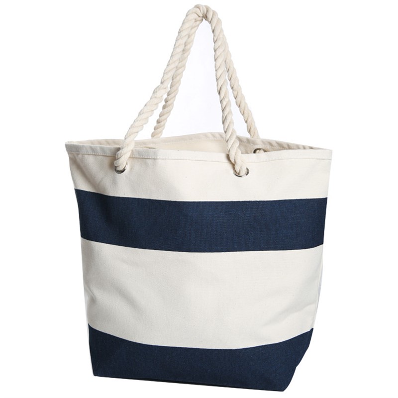 Cotton canvas cruising tote with rope handle.