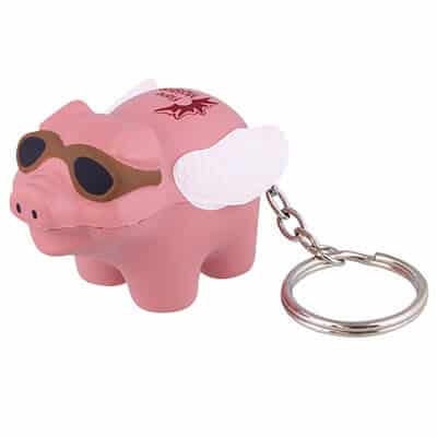 Foam pink flying pig stress ball key ring with a promotional logo.