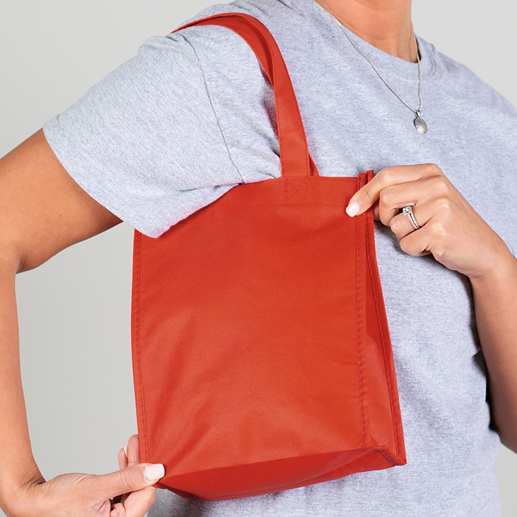 Blank polypropylene tote bag with 4-inch gussets.