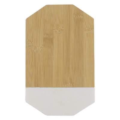 Octogonal white marble and bamboo cutting board blank.