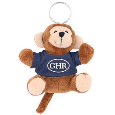Plush and cotton monkey key chain with navy shirt with branded imprint.
