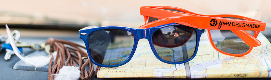 Blue custom sunglasses and orange personalized sunglasses with white imprint