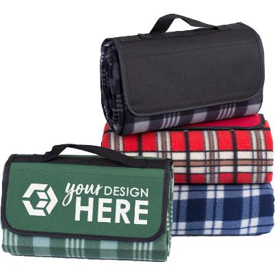 Customized green plaid fleece blanket with attached handle.
