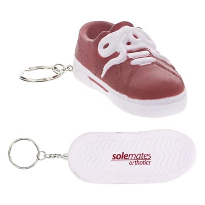 Foam sneaker stress reliever key ring with imprinting.