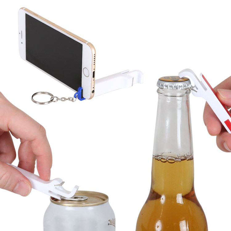 Plastic white phone stand metal bottle opener.