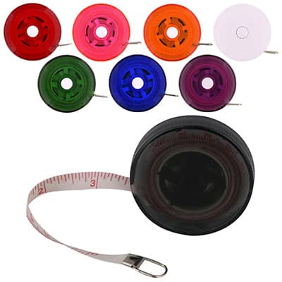 ABS plastic translucent black 5 foot round tape measure blank.