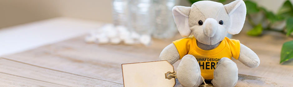 Mascot stuffed animals elephant mascot with yellow shirt and black imprint
