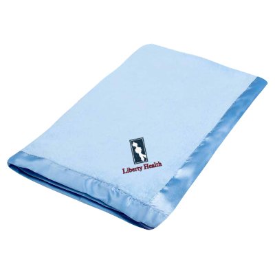 Embroidered plush with satin edged baby blanket light blue.